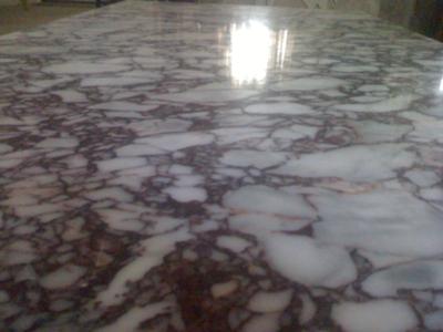 What are some tips for cleaning old marble?