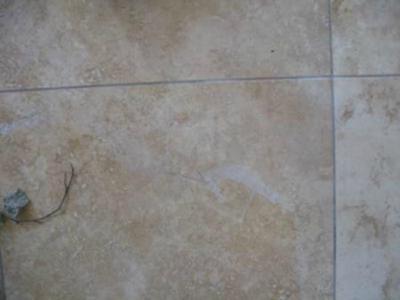 Hazy Film on Travertine Tile After Sealing