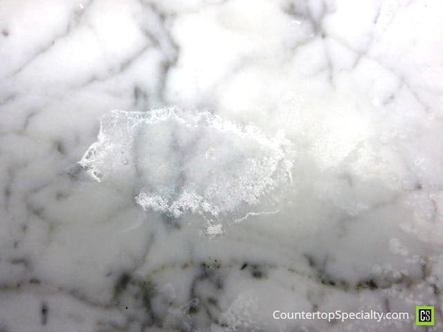 dull spot etch marks from CLR cleaner damage on marble countertops