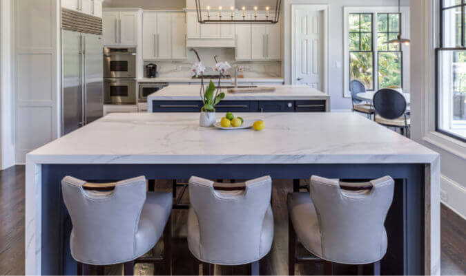 white Neolith estatuario countertops on a large luxury kitchen island