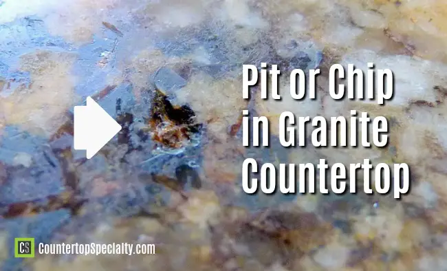 large pit or chip in granite countertop surface