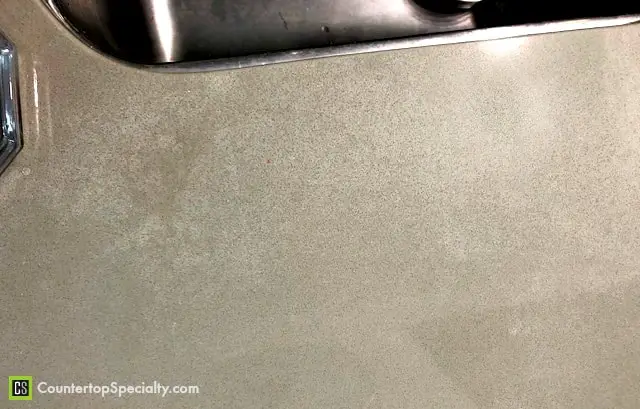 cloudy blotches beige Silestone countertops around sink