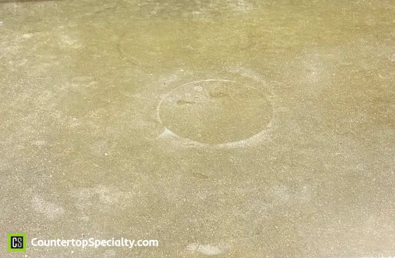 etching damage from using harsh products when cleaning concrete countertops