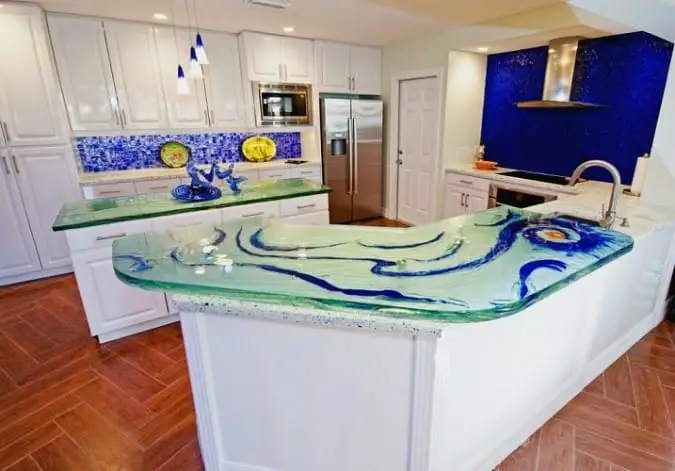 glass countertop with custom blue color swirls on kitchen island