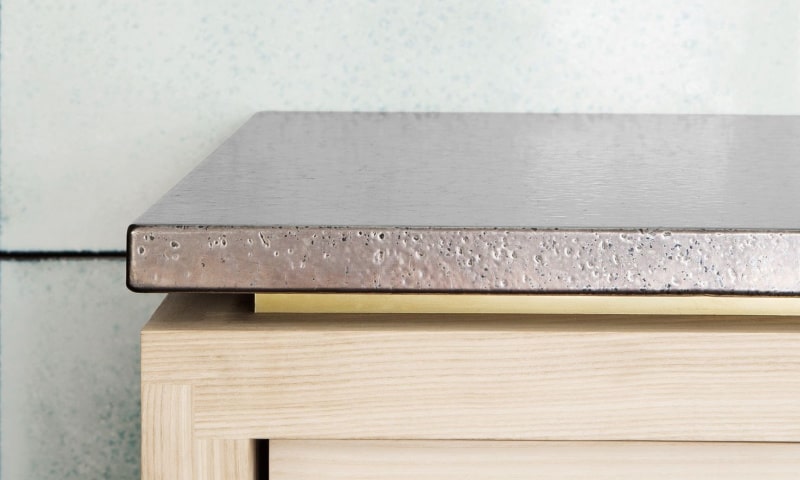 metallic finish on volcanic lava stone countertops