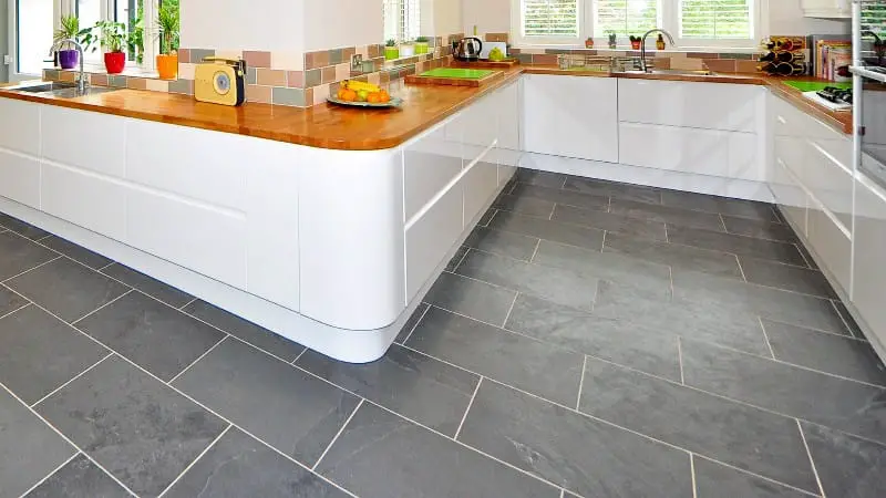 stone flooring gray quartzite tile in large kitchen