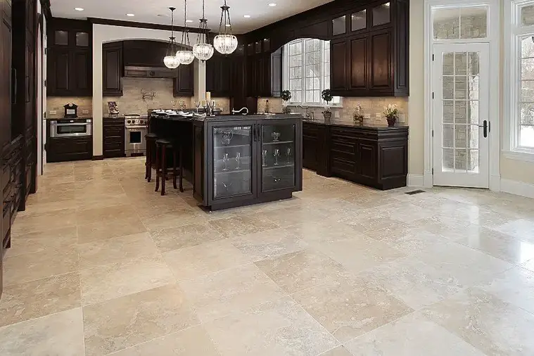 Travertine flooring in large modern kitchen