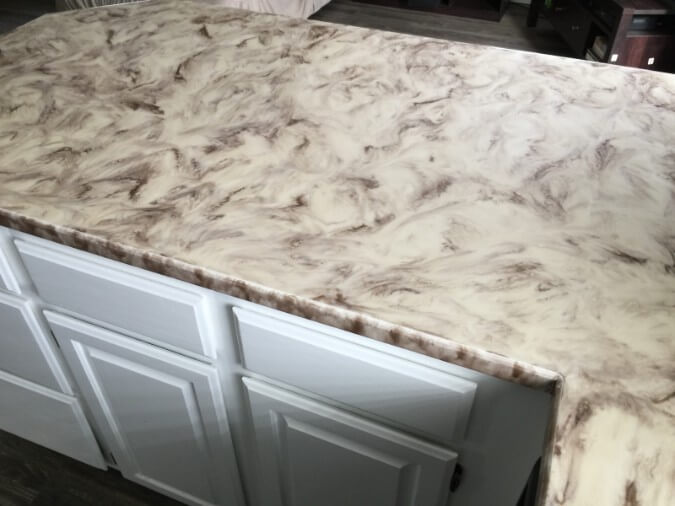 epoxy countertops with white and coffee colored swirl pattern in new kitchen